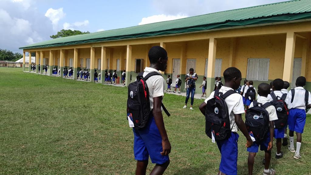 Students head back to class after morning assembly